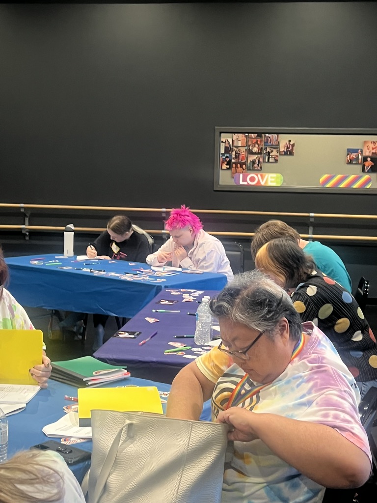 Participants writing their stories at the Young Equal workshop