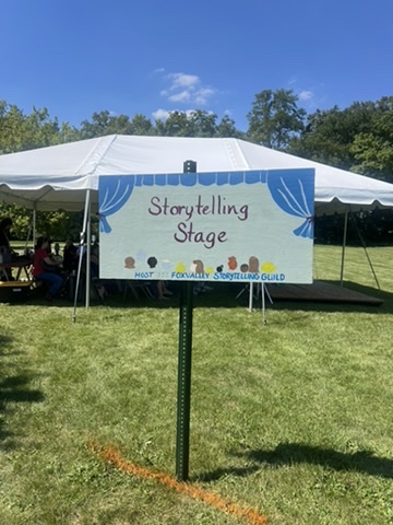 The storytelling stage sign at the Fox Valley Folk Festival